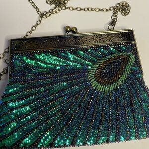 Elegant Beaded Clutch with Peacock Design